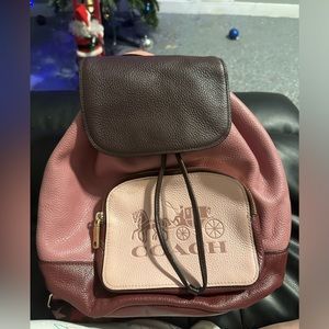 Pink and burgundy coach purse